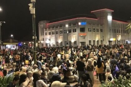 Ilustrasi keramaian di kawasan Titik Nol, dekat Malioboro, Jogja.