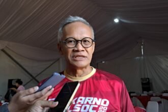 Ketua Pengarah Pelaksana Soekarno Run SOC 2026, Aria Bima, memaparkan prediksi perputaran uang dari event yang ia helat, Minggu (28/6/2026). (bae)