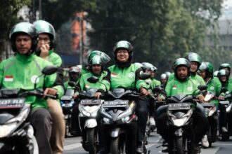 Ilustrasi pengemudi ojek online (ojol).